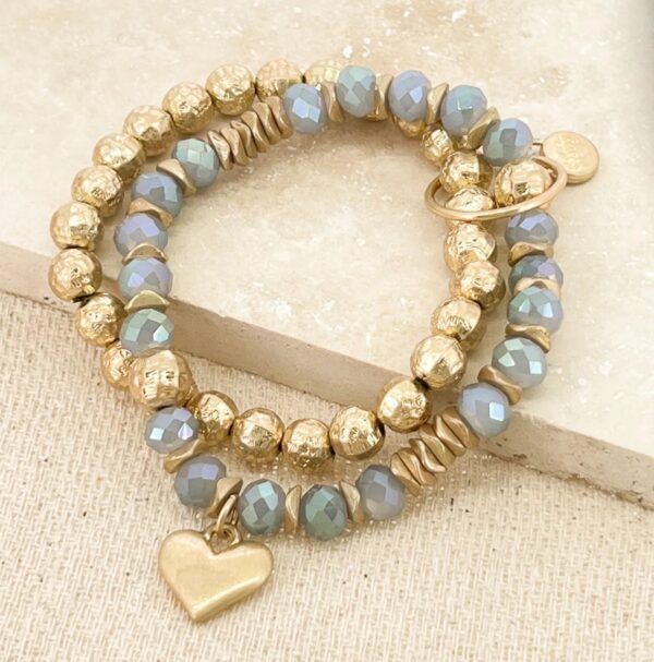 Gold and pale blue faceted bead multi layer stretch bracelet