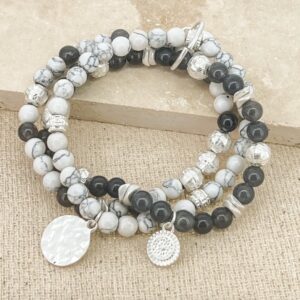 Silver layered stretch bracelet with white and grey beads