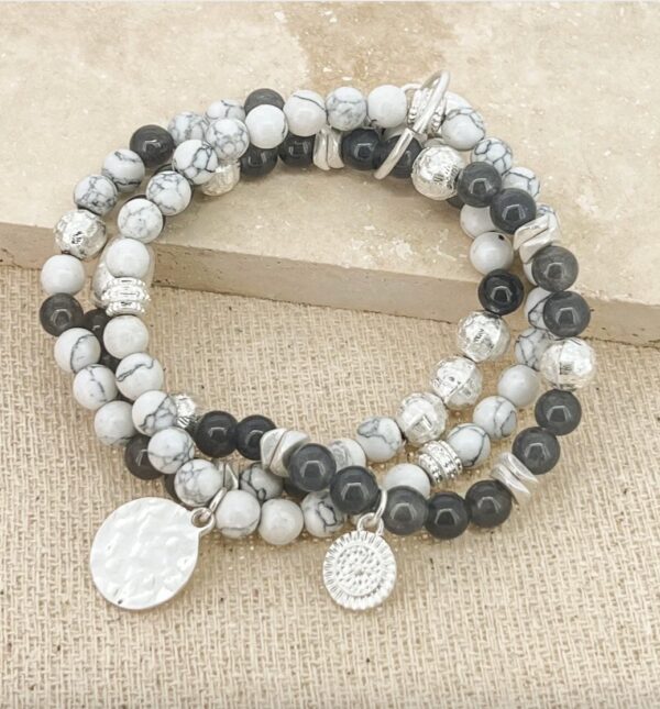 Silver layered stretch bracelet with white and grey beads
