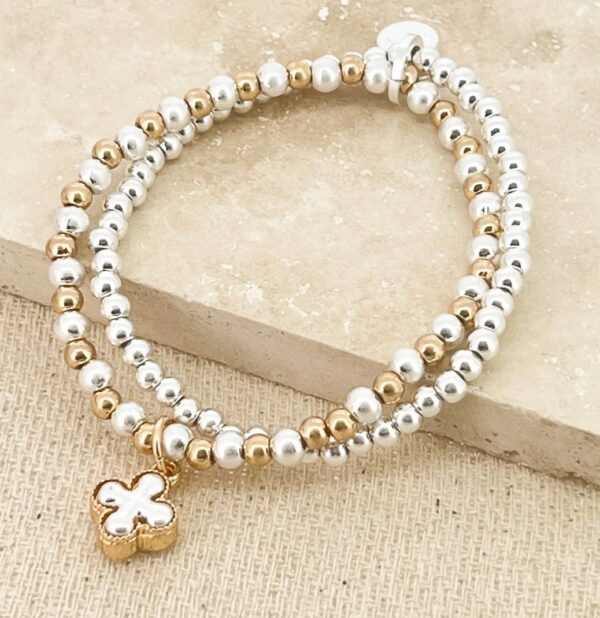 Gold and White semi precious bead layer bracelet with clover charm