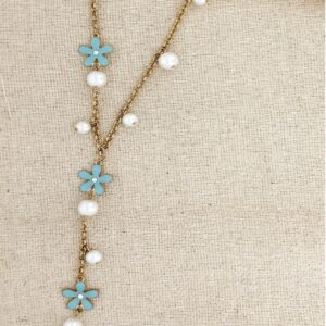 Long gold necklace with blue flowers and pearls